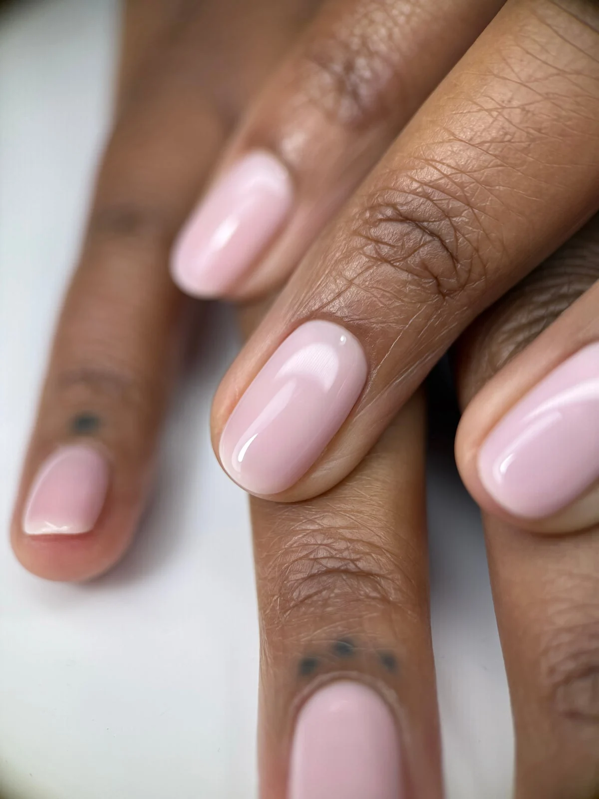 Close-up of Russian manicure technique featured in the foundations course